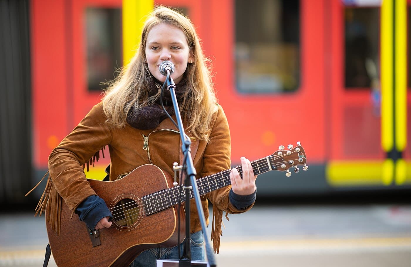Cecile busking